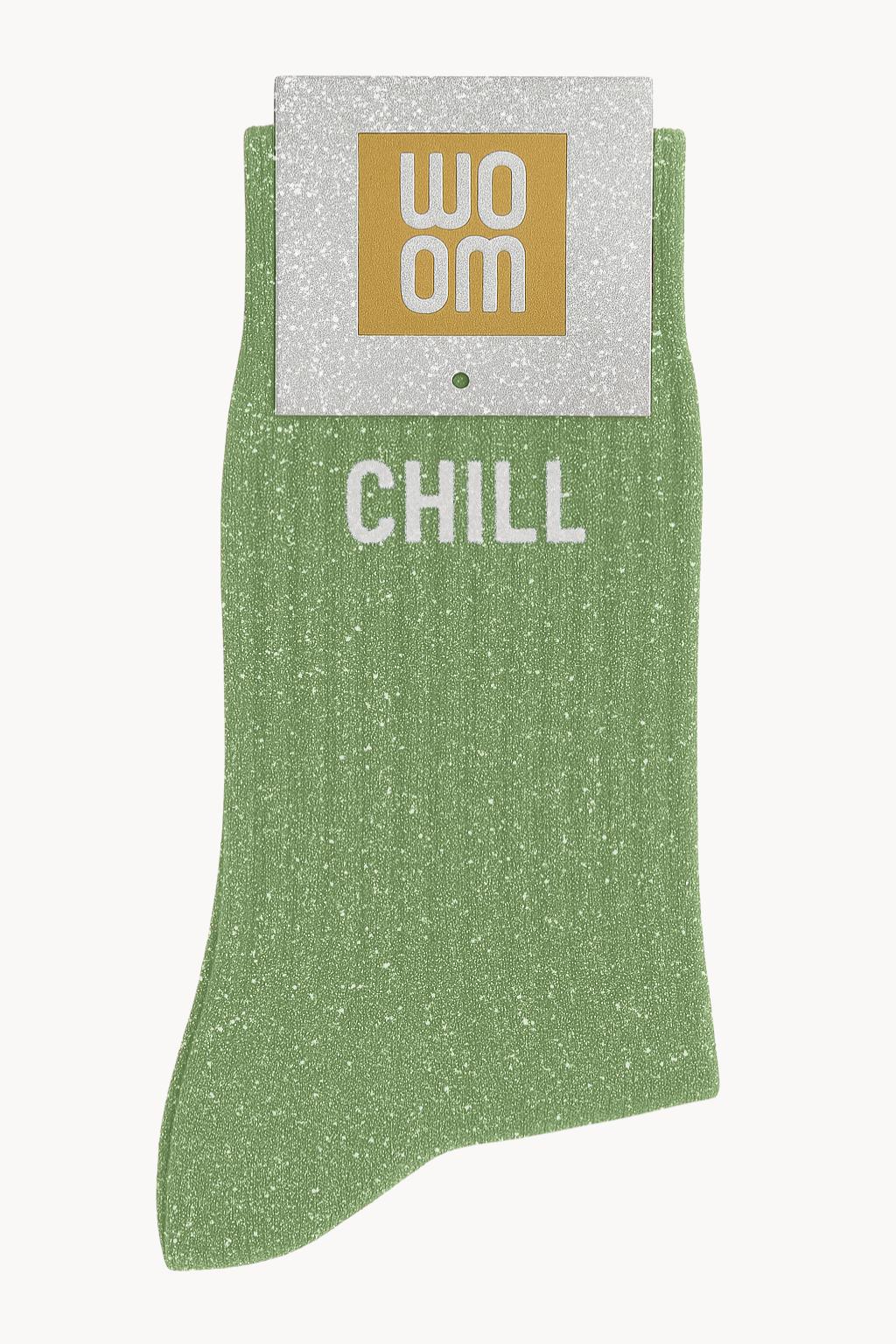chaussettes vertes paillettée avec message chill et son packaging