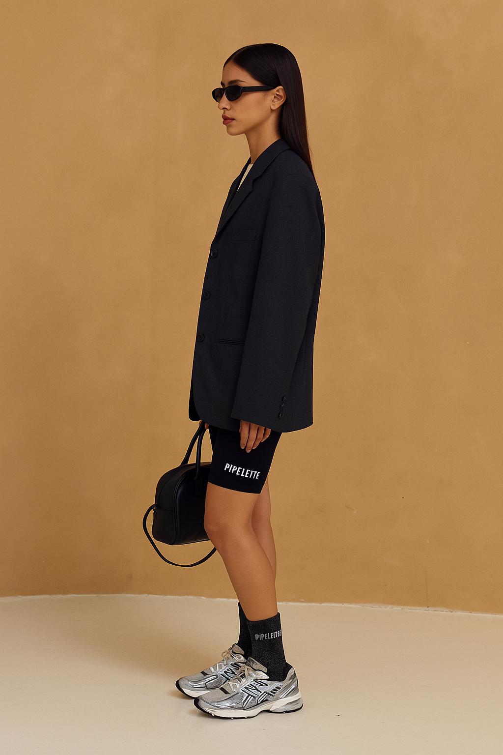 Chaussettes Noires à paillettes modèle  "Pipelette" portées - Look tendance Chaussettes Glitter - Woom