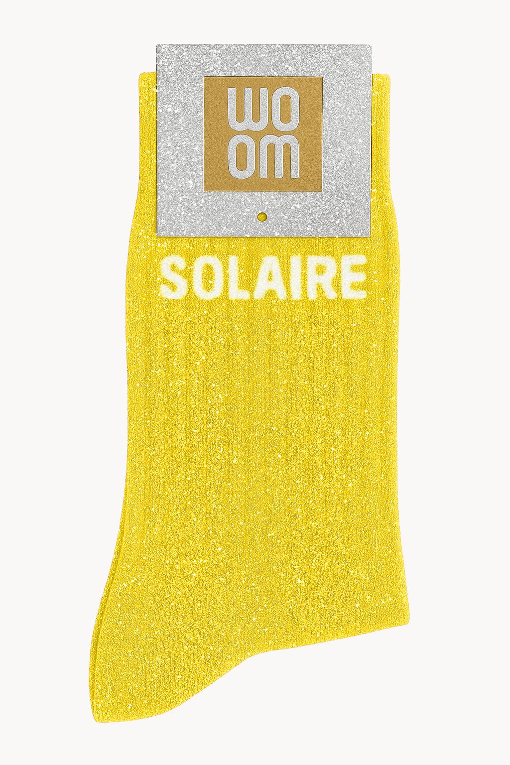chaussettes jaunes à paillettes avec message solaire