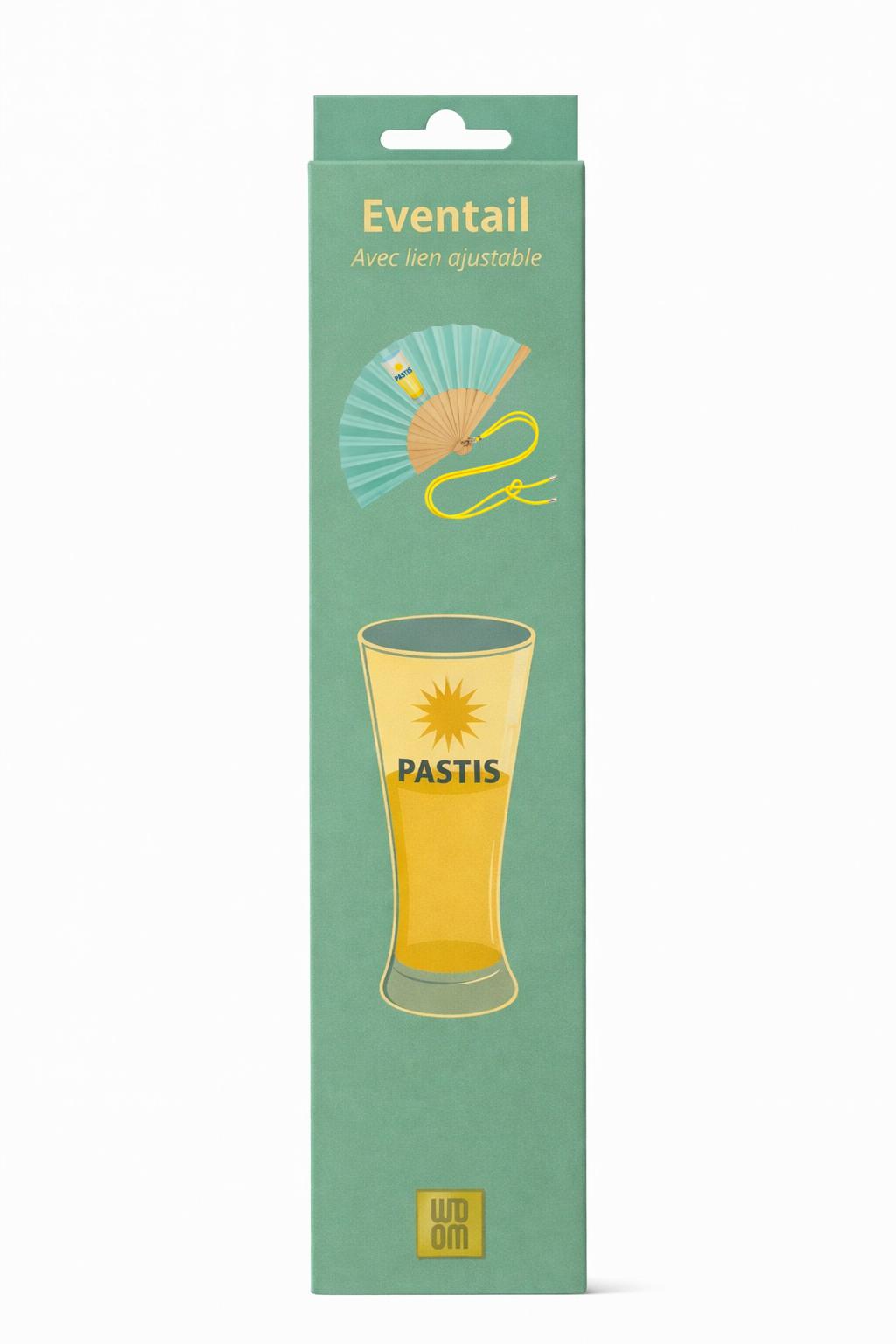 Boîte cadeau de l’éventail avec bandoulière Pastis, illustrée d’un verre de pastis, aux couleurs vert d’eau et jaune, avec logo WOOM.

